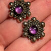 This is a pair of vintage sterling silver amethyst floral stud earrings.#121