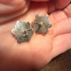 This is a pair of vintage sterling silver amethyst floral stud earrings.#121