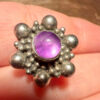 This is a pair of vintage sterling silver amethyst floral stud earrings.#121