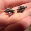 This is a pair of vintage sterling silver amethyst floral stud earrings.#121