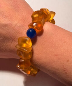 Ancient high-quality large amber bracelet with a chalcedony bead
