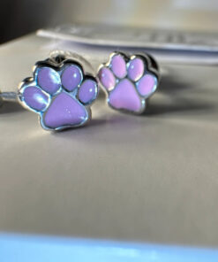 Silver paw-shaped stud earrings with enamel