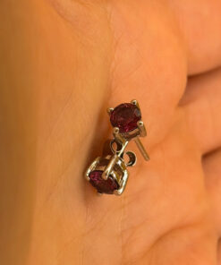Vintage sterling silver stud earrings featuring tourmaline or cubic zirconia