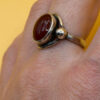 vintage sterling silver ring features a large, oval-shaped cabochon carnelian stone Size M#146