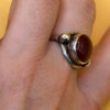 vintage sterling silver ring features a large, oval-shaped cabochon carnelian stone Size M#146