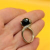 Cupronickel ring with a sulfur stone (possibly onyx), UK size K #150
