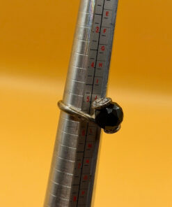 Cupronickel ring with a sulfur stone (possibly onyx), UK size K