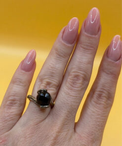 Cupronickel ring with a sulfur stone (possibly onyx), UK size K