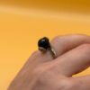 Cupronickel ring with a sulfur stone (possibly onyx), UK size K #150
