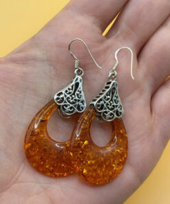 A pair of ornate sterling silver and reconstituted amber earrings #151