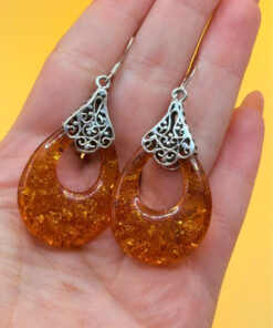 A pair of ornate sterling silver and reconstituted amber earrings #151
