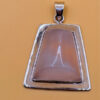 sterling silver pendant featuring a natural rose quartz #142