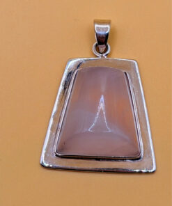 sterling silver pendant featuring a natural rose quartz #142