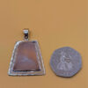 sterling silver pendant featuring a natural rose quartz #142