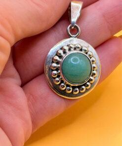 sterling silver pendant featuring a round green aventurine Mexico