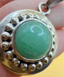 sterling silver pendant featuring a round green aventurine Mexico