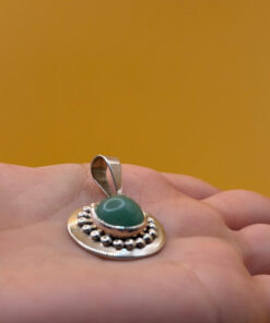 sterling silver pendant featuring a round green aventurine Mexico