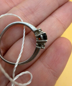 Silver ring with almandine garnet, size O