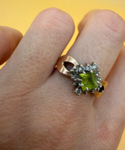 Silver ring with 14K gold plating and peridot, size O