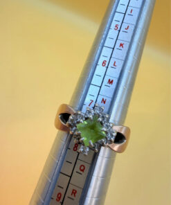 Silver ring with 14K gold plating and peridot, size O