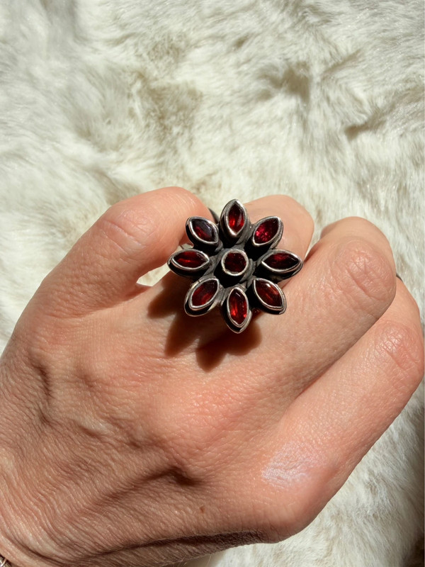 New 925 sterling silver ring with garnets, weight 8.6 g, size O.