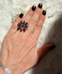 New 925 sterling silver ring with garnets, weight 8.6 g, size O.