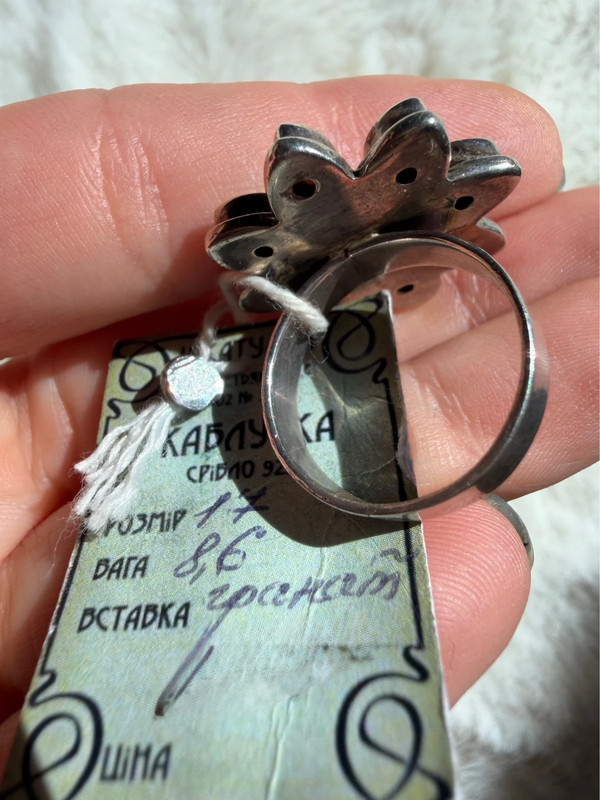New 925 sterling silver ring with garnets, weight 8.6 g, size O.