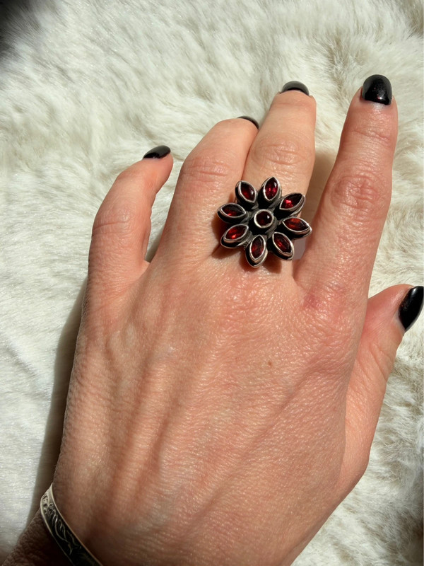 New 925 sterling silver ring with garnets, weight 8.6 g, size O.