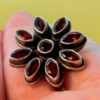 New 925 sterling silver ring with garnets, weight 8.6 g, size O.