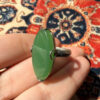 Uk size Q, silver plated ring with green unknown stone