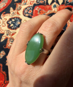 Uk size Q, silver plated ring with green unknown stone
