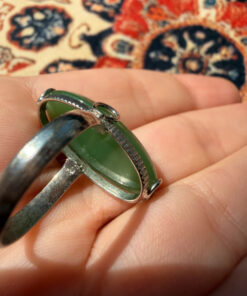 Uk size Q, silver plated ring with green unknown stone