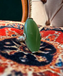 Uk size Q, silver plated ring with green unknown stone