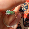 Uk size Q, silver plated ring with green unknown stone
