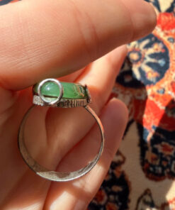 Uk size Q, silver plated ring with green unknown stone