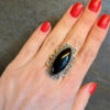 An incredibly beautiful vintage ring with black onyx, size R, sterling silver