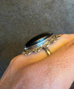 An incredibly beautiful vintage ring with black onyx, size R, sterling silver