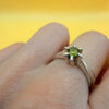A silver ring with a natural peridot, size N #37
