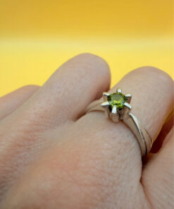 A silver ring with a natural peridot, size N #37