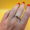 A silver ring with a natural peridot, size N #37