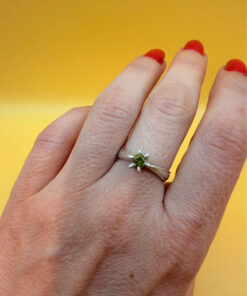 A silver ring with a natural peridot, size N #37