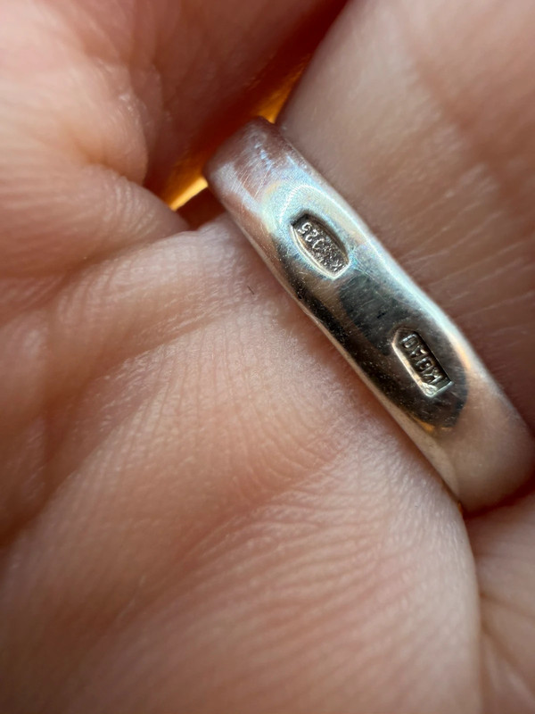 A silver ring with a natural peridot, size N #37