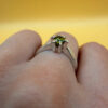 A silver ring with a natural peridot, size N #37