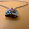 Silver bell-shaped pendant (jingles) and a Soviet-era silver chain