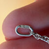 Silver bell-shaped pendant (jingles) and a Soviet-era silver chain