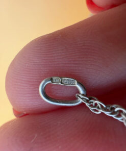 Silver bell-shaped pendant (jingles) and a Soviet-era silver chain