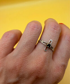 Religious ring with a cross and a blue stone, size N with the engraving: “Save and protect”