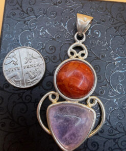 Wonderful silver angel pendant with red jasper and amethyst. Brings happiness