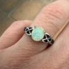 Nickel opal ring, size K.