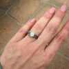 Nickel opal ring, size K.